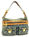 Louis Vuitton Monogram Denim Baggy PM shoulder bag in blue with tan leather trim and gold-tone hardware.