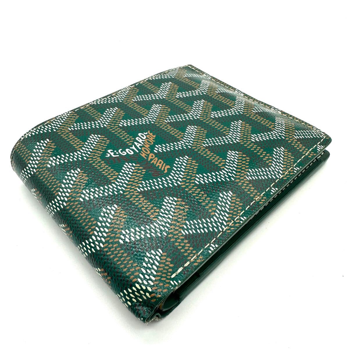 Green Goyard Saint Florentin bi-fold wallet in signature Goyardine canvas on a clean white background.