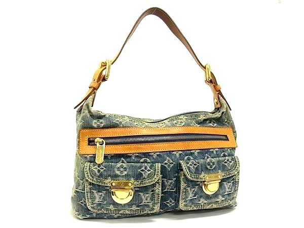 Louis Vuitton Monogram Denim Baggy PM shoulder bag in blue with tan leather trim and gold-tone hardware.
