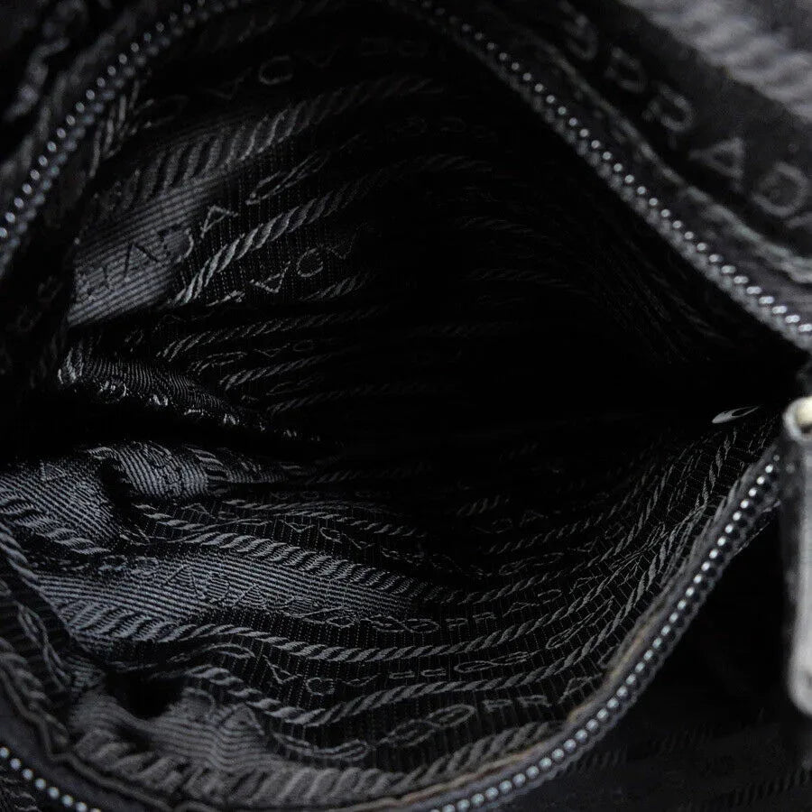 prada_triangle_logo_backpack96499853232997 - zeitlos.