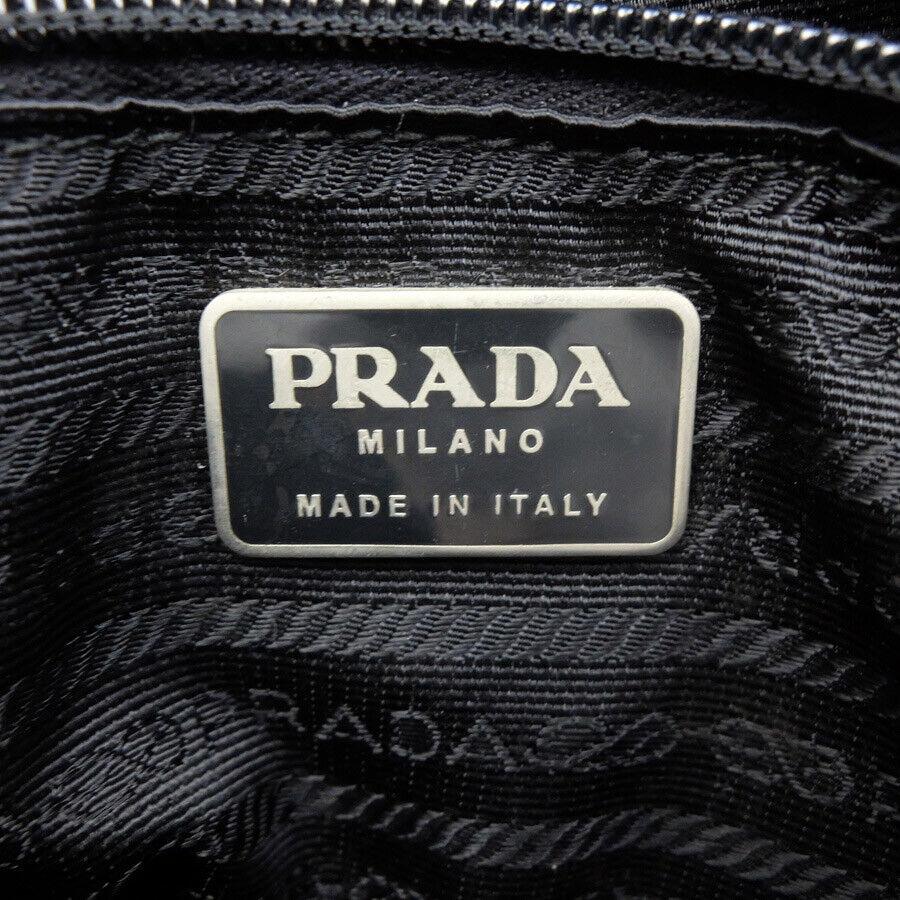 prada_triangle_logo_backpack96499853232999 - zeitlos.
